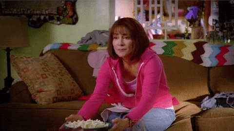 Team Bios 40 Caroline Eating Popcorn