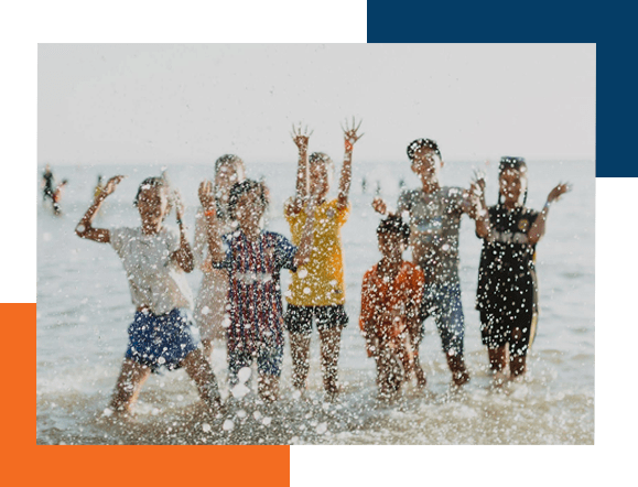 Children having fun by the beach, linked to our Program helping missionaries with their finances