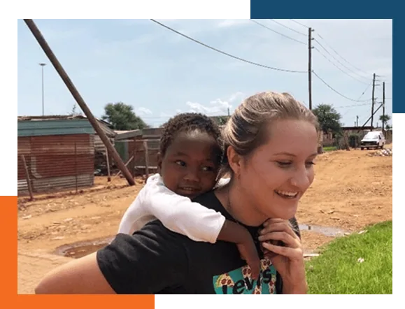 Stephanie-Quittenbaum-Photo-Submission-2 A worldwide medical insurance member giving a child a piggy-back ride across the street